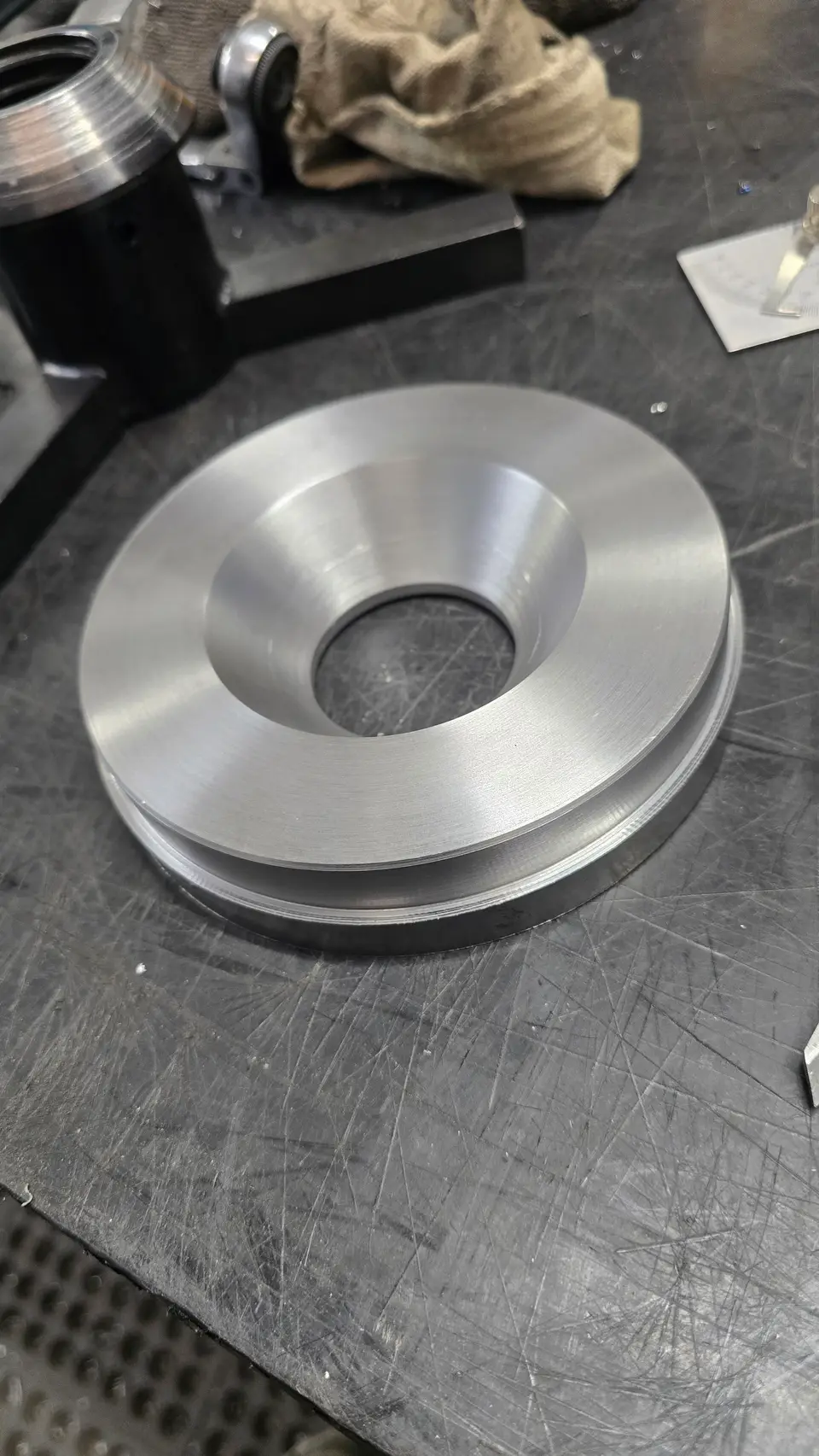 Machined prototype component on the bench
