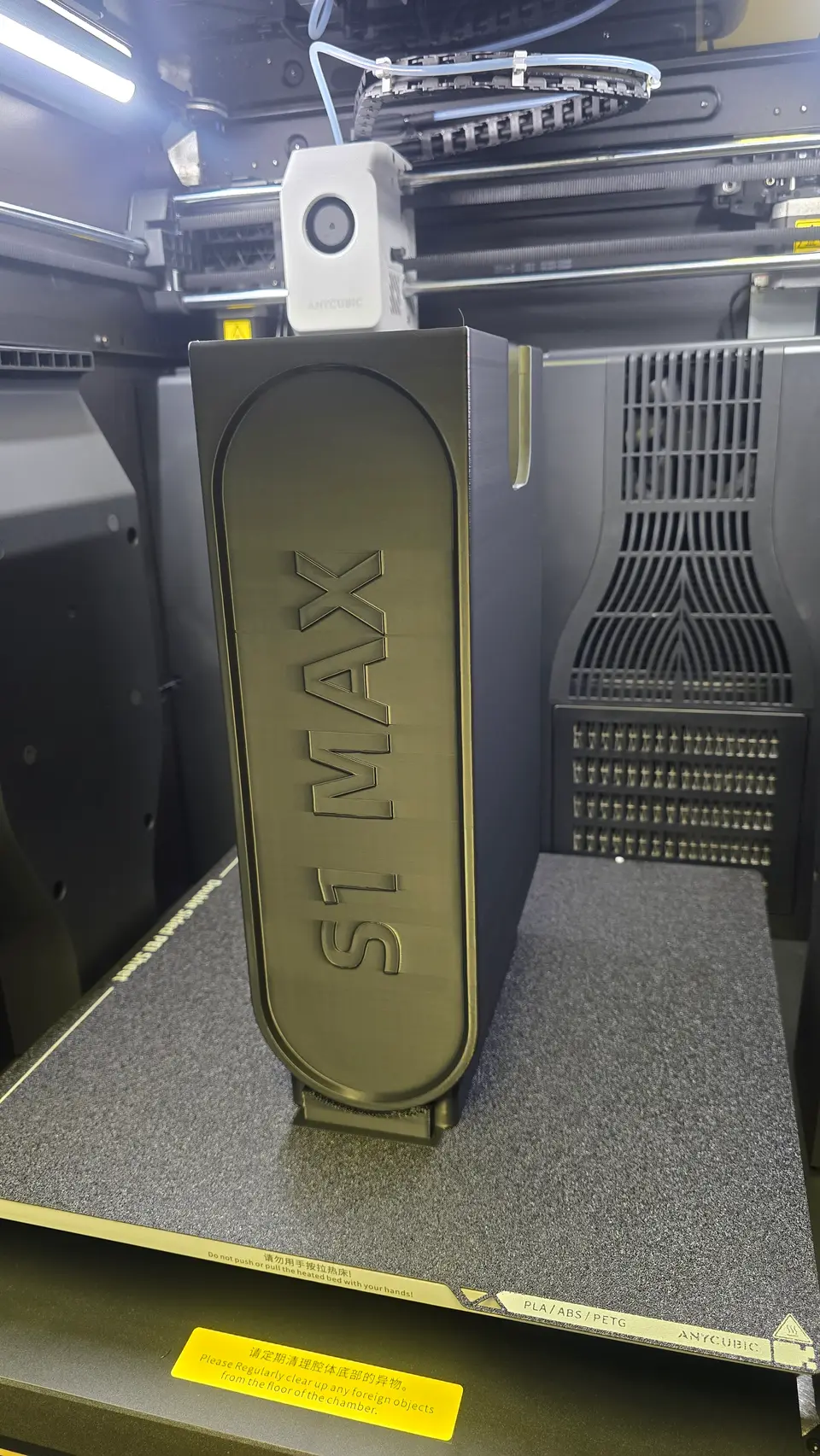3D-printed prototype part on the printer bed